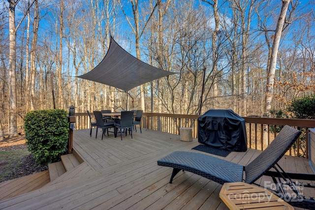 wooden deck with grilling area