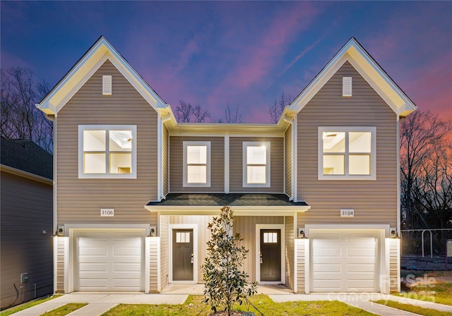 view of front of property with a garage