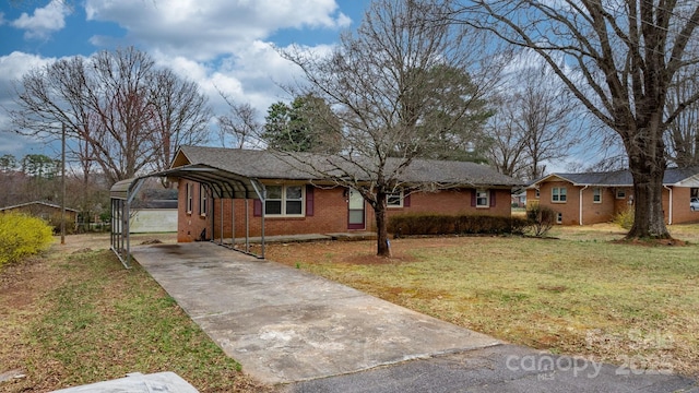 ranch-style home with brick siding and a front lawn