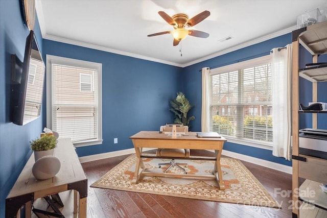 office space featuring crown molding, dark wood-type flooring, and ceiling fan