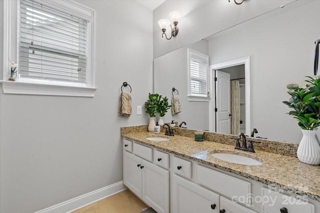 bathroom featuring vanity and tile patterned flooring