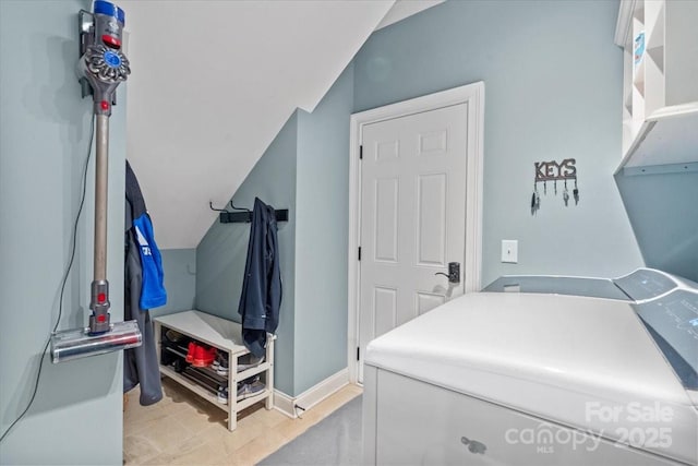 clothes washing area featuring washing machine and dryer