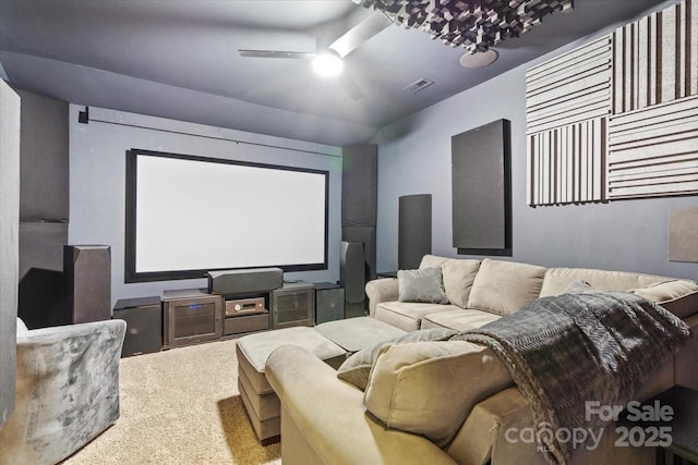 home theater room with carpet flooring and ceiling fan