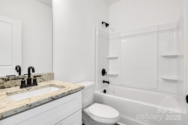 full bathroom featuring shower / washtub combination, vanity, and toilet