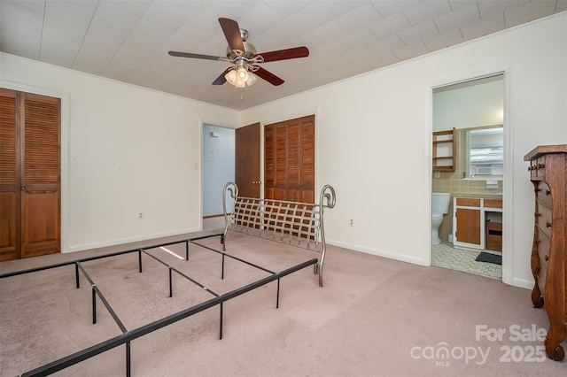 bedroom with light colored carpet