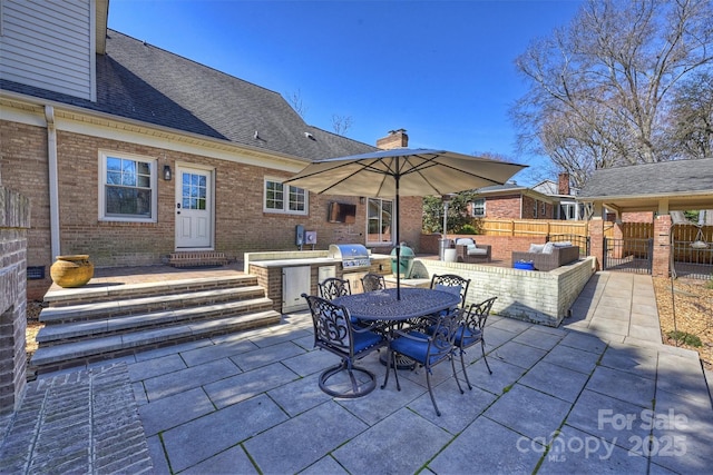 view of patio / terrace featuring grilling area, area for grilling, outdoor dining space, fence, and an outdoor living space