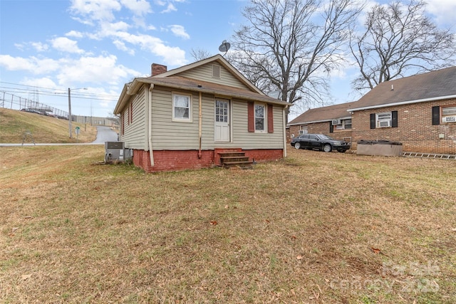 view of front of house with a front lawn