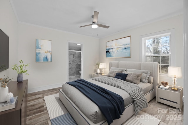 bedroom with hardwood / wood-style floors, ornamental molding, ceiling fan, and ensuite bathroom