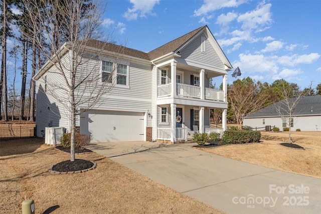 view of front of house with a garage and a porch