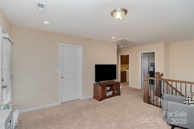 living room with light carpet