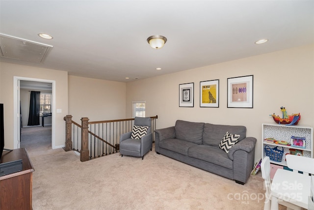 living room with light colored carpet