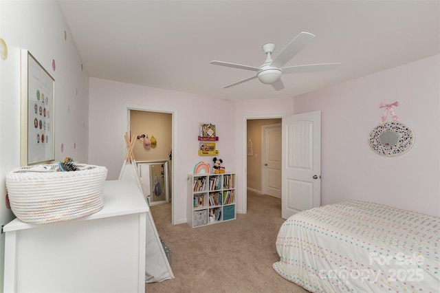 bedroom with light carpet and ceiling fan