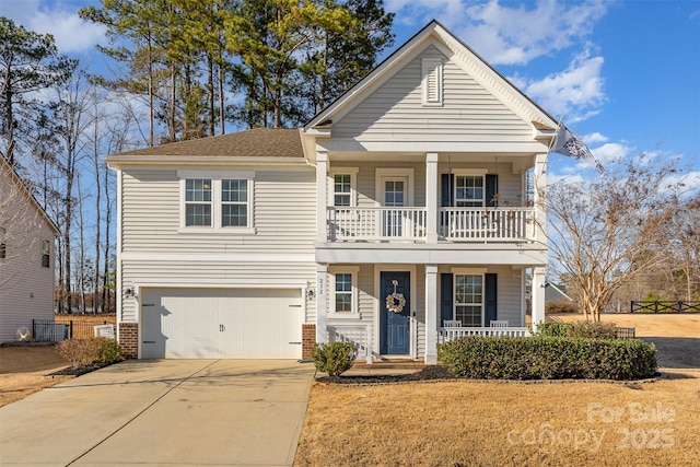 view of front facade featuring a garage and covered porch