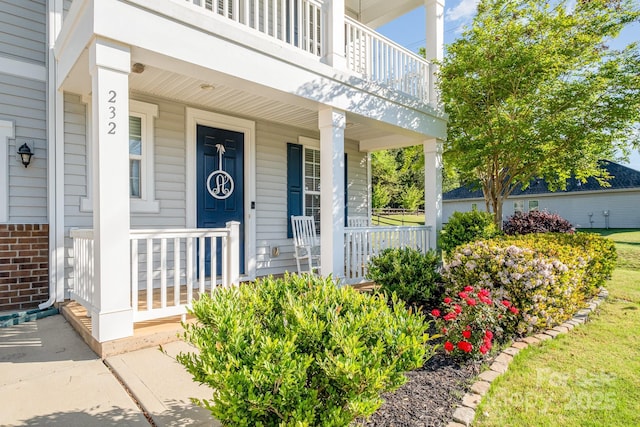 232 Morgans Branch Rd, Belmont, NC 28012 - doorway to property with brick siding and a porch
