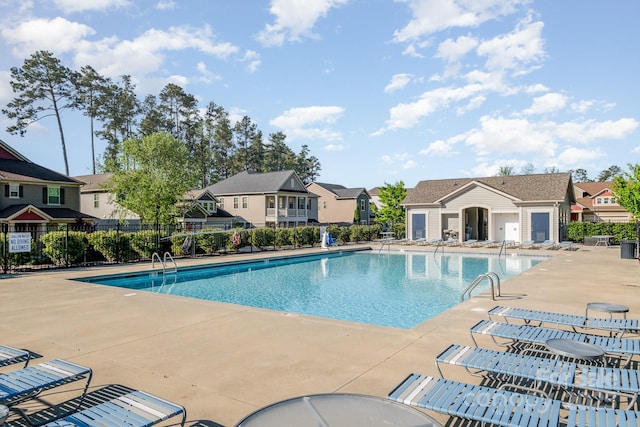 232 Morgans Branch Rd, Belmont, NC 28012 - community pool featuring fence, a residential view, and a patio