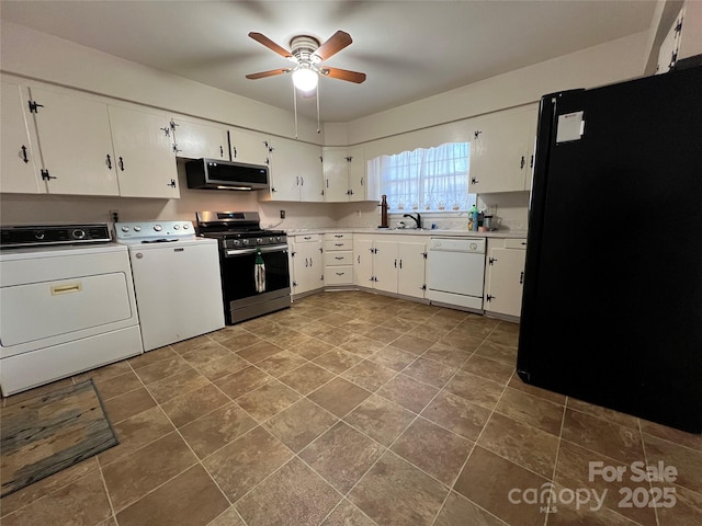 kitchen featuring appliances with stainless steel finishes, white cabinetry, sink, ceiling fan, and washer and clothes dryer