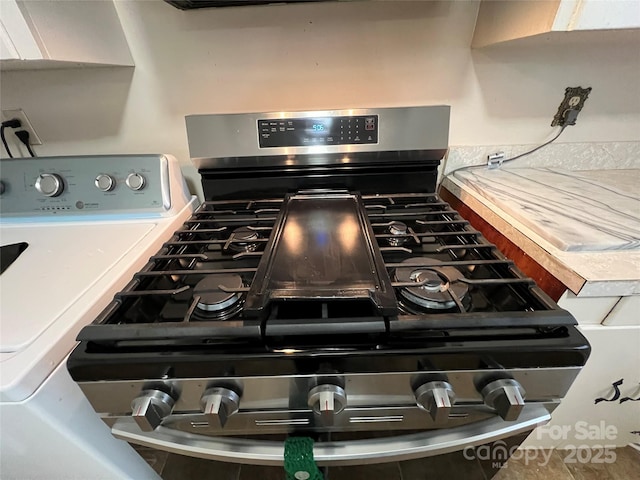 room details with stainless steel gas range