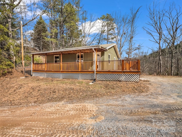 view of front of property featuring a wooden deck