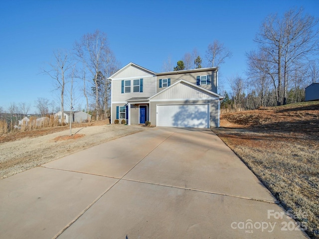 view of front of property featuring a garage