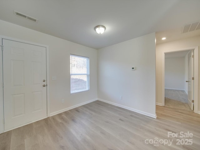 foyer entrance featuring light hardwood / wood-style flooring