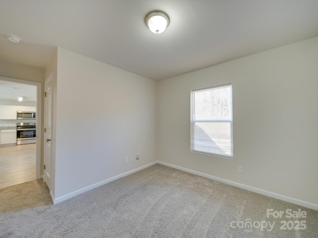 view of carpeted spare room