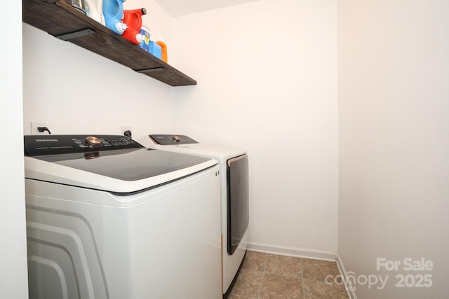 laundry room with washer and dryer