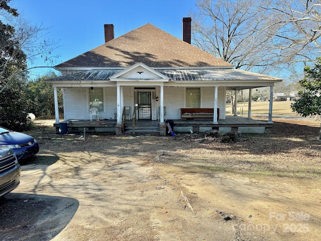 view of front of home featuring covered porch