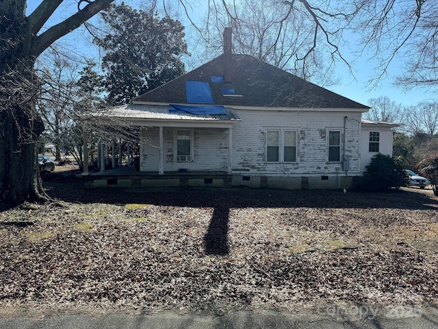 back of house featuring covered porch