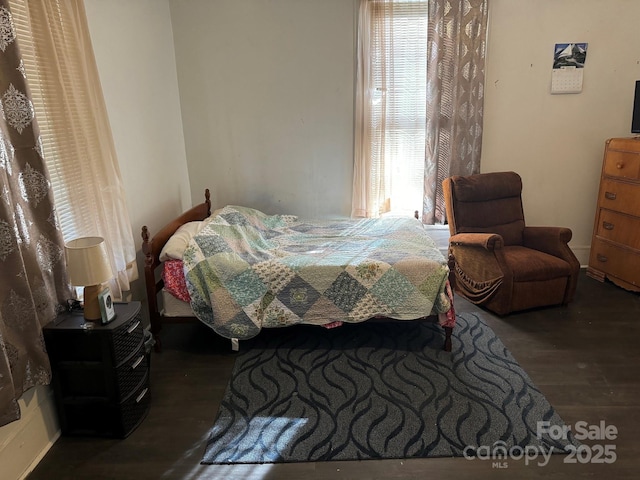 bedroom featuring hardwood / wood-style flooring