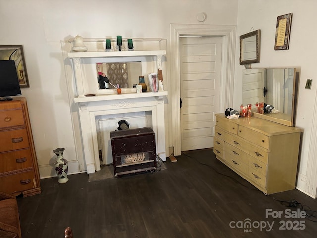 miscellaneous room with dark hardwood / wood-style floors