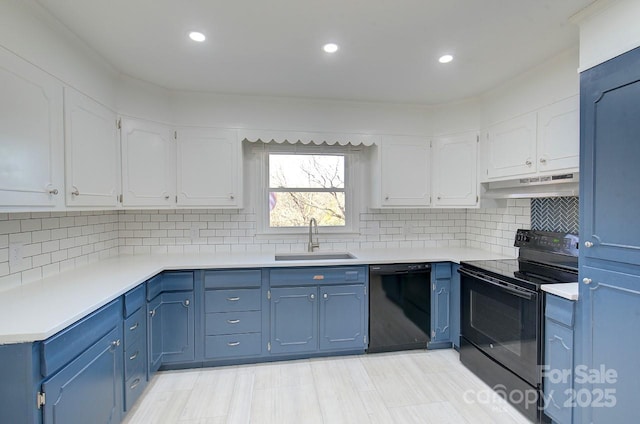 kitchen with tasteful backsplash, sink, black appliances, and white cabinets