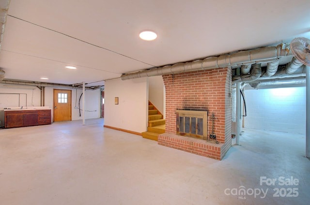 basement featuring a fireplace