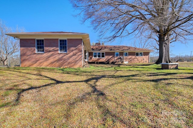 1491 Black Hwy, York, SC 29745 - back of house featuring brick siding and a yard