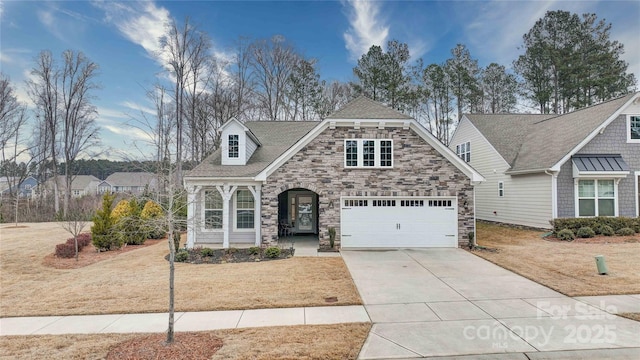 view of front facade with a garage and a front yard