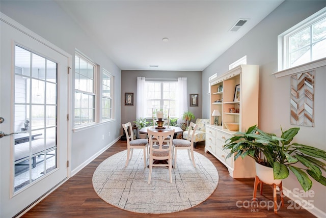 dining room featuring dark wood-type flooring