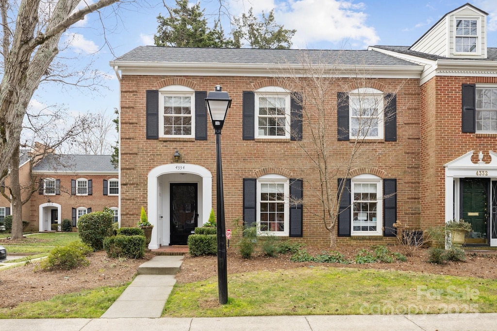 view of front of home with a front yard