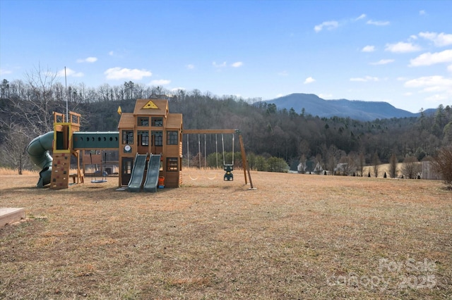 view of playground featuring a mountain view