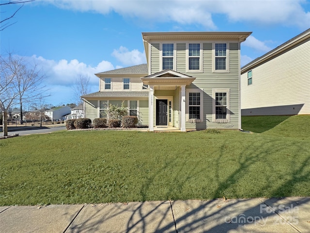 view of front of house with a front lawn