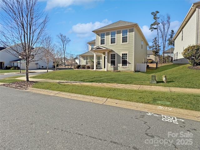 view of front of house featuring a front lawn