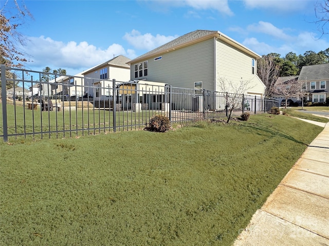 view of home's exterior featuring a lawn