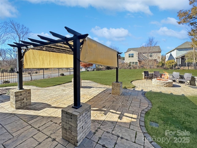 view of patio with an outdoor fire pit and a pergola