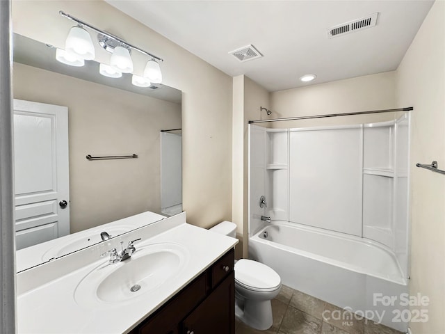 full bathroom featuring tile patterned flooring, vanity, tub / shower combination, and toilet