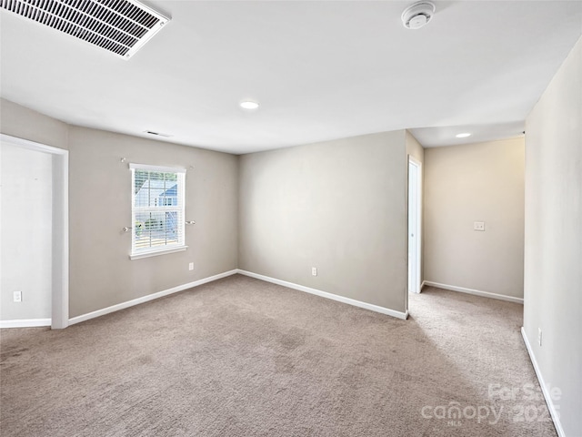 view of carpeted spare room