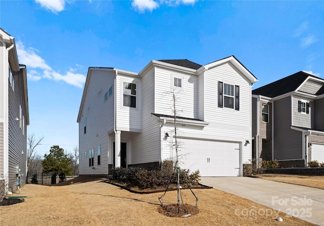 view of front of property featuring a garage