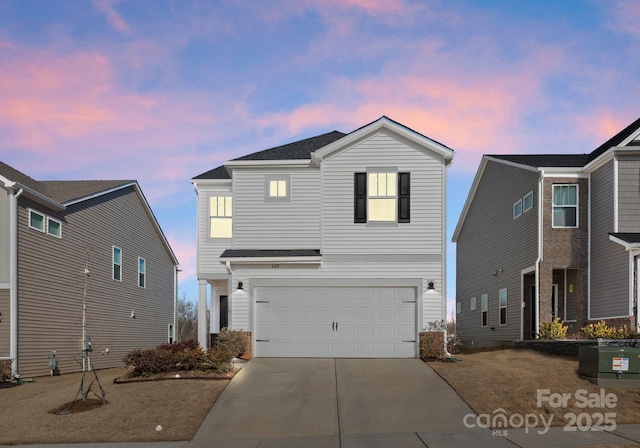 front of property featuring a garage