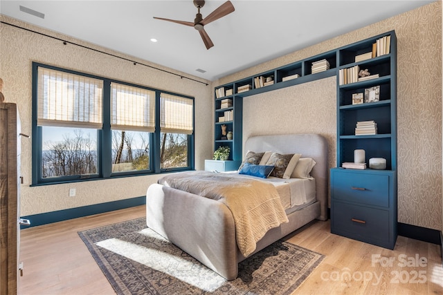 bedroom with light wood-type flooring