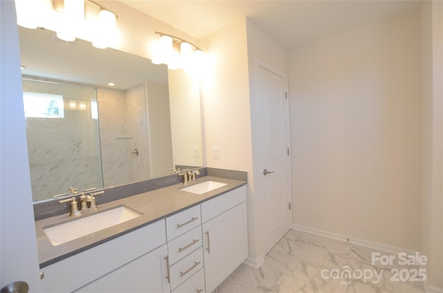 bathroom featuring vanity and a tile shower