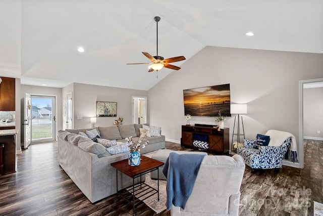 living room featuring lofted ceiling, dark hardwood / wood-style floors, and ceiling fan