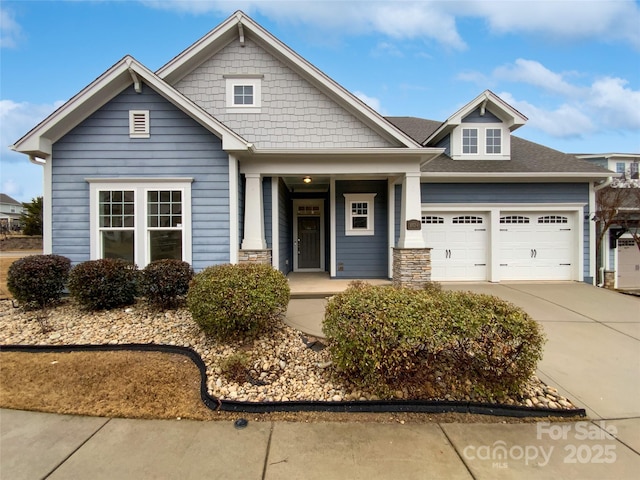 craftsman-style home with a garage