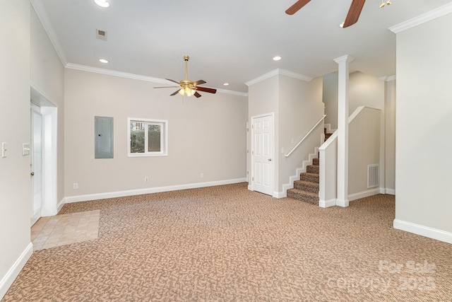 unfurnished living room featuring light carpet, ornamental molding, electric panel, and ceiling fan